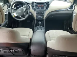 2018 Hyundai Santa Fe 2.4L z VIN 5NMZU3LB6JH104469, wystawiony jako Copart lot #57587495 z przebiegiem 78 267 mil mil oraz Szkoda całkowita • Salvage title. Historia ofert i sprzedaży dostępna na DreamBid. Obrazek 8.
