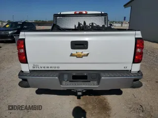 2018 Chevrolet Silverado 1500 LT with VIN 1GCRCREC2JZ217553, listed as a Copart auction lot 51945385 with 117,514 mi miles and Salvage Title. Bid and sale history available at DreamBid. Image 6.
