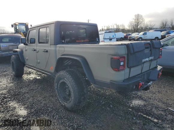 2020 Jeep Gladiator Overland with VIN 1C6HJTFG8LL147702, listed as a Copart auction lot 48613135 with 159,558 mi miles and Clean title. Bid and sale history available at DreamBid. Image 2.