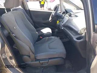 2009 Honda Fit with VIN JHMGE882X9S000639, listed as a IAAI auction lot 42308524 with 211,128 mi miles and . Bid and sale history available at DreamBid. Image 5.