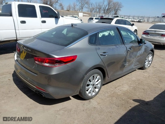 2018 Kia Optima S with VIN 5XXGT4L31JG267408, listed as a IAAI auction lot 41780014 with 111,940 mi miles. Bid and sale history available at carsss.com. Image 4.