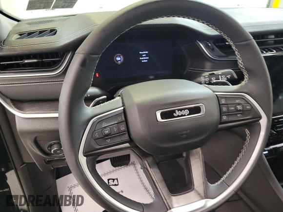 2023 Jeep Grand Cherokee Limited with VIN 1C4RJHBGXPC545550, listed as a IAAI auction lot 42859716 with 34,610 mi miles and . Bid and sale history available at DreamBid. Image 12.