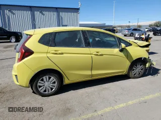 2015 Honda Fit LX z VIN 3HGGK5H58FM744653, wystawiony jako Copart lot #47310345 z przebiegiem 72 840 mil mil oraz Szkoda całkowita • Salvage title. Historia ofert i sprzedaży dostępna na DreamBid. Obrazek 3.