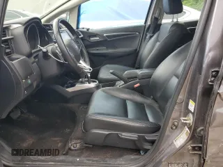 2015 Honda Fit EX-L z VIN 3HGGK5H80FM701807, wystawiony jako Copart lot #53103495 z przebiegiem 95 224 mil mil oraz Szkoda całkowita • Salvage title. Historia ofert i sprzedaży dostępna na DreamBid. Obrazek 7.