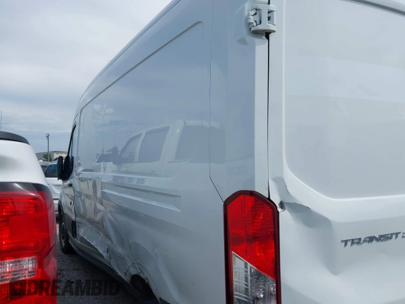 2019 Ford Transit with VIN 1FTYR2CM3KKB86806, listed as a IAAI auction lot 42633294 with 148,555 mi miles and . Bid and sale history available at DreamBid. Image 14.