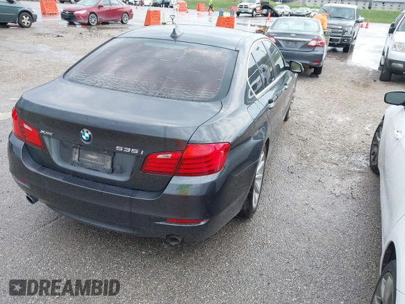 2015 BMW 5 Series 535i xDrive with VIN WBA5B3C59FD545279, listed as a IAAI auction lot 41810032 with 122,936 mi miles. Bid and sale history available at carsss.com. Image 4.