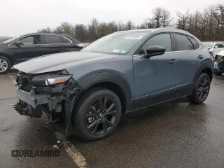 2023 Mazda CX-30 S Carbon Edition with VIN 3MVDMBCM5PM556195, listed as a Copart auction lot 47013945 with 15,223 mi miles and Salvage Title. Bid and sale history available at DreamBid. Image 1.