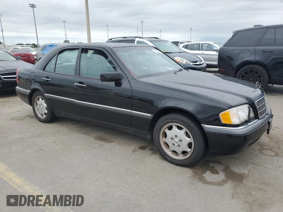 1997 Mercedes-Benz C z VIN WDBHA23EXVF560999, wystawiony jako Copart lot #74100944 z przebiegiem Nie podano mil oraz Nie do naprawy • Non repairable. Historia ofert i sprzedaży dostępna na DreamBid. Obrazek 4.