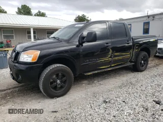 2014 Nissan Titan Pro-4X with VIN 1N6AA0EC5EN502837, listed as a Copart auction lot 79527334 with 123,068 mi miles and Salvage title. Bid and sale history available at DreamBid. Image 1.