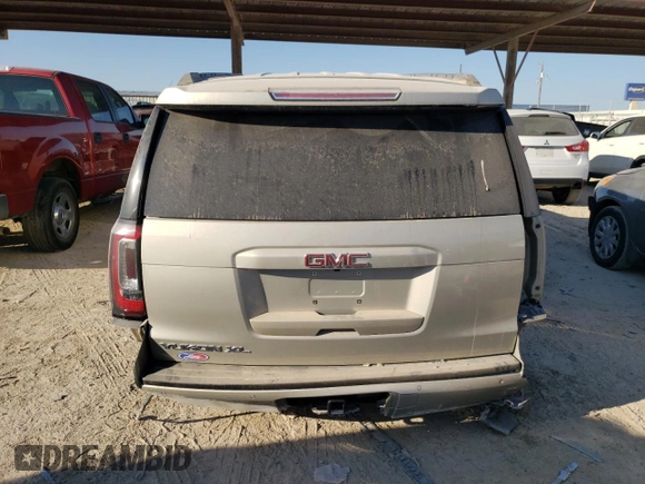 2017 GMC Yukon XL SLT with VIN 1GKS1GKC8HR244920, listed as a Copart auction lot 74199764 with 151,777 mi miles and Salvage Title. Bid and sale history available at DreamBid. Image 6.