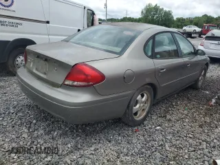 2004 Ford Taurus SE with VIN 1FAFP53274A193186, listed as a Copart auction lot 60255125 with 184,493 mi miles and Salvage title. Bid and sale history available at DreamBid. Image 3.