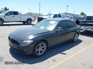 2014 BMW 3 Series 328d xDrive with VIN WBA3D5C55EKX96307, listed as a IAAI auction lot 42533740 with 169,229 mi miles and . Bid and sale history available at DreamBid. Image 2.