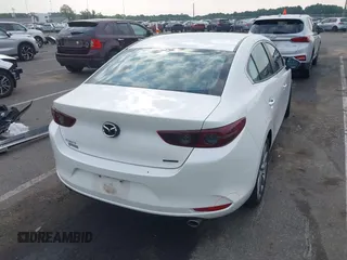 2021 Mazda 3 Preferred with VIN JM1BPACL4M1311415, listed as a IAAI auction lot 42490995 with 38,015 mi miles and . Bid and sale history available at DreamBid. Image 4.