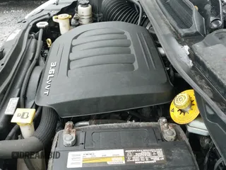 2014 Dodge Grand Caravan SE 30th Anniversary with VIN 2C4RDGBG8ER450779, listed as a IAAI auction lot 43282325 with 147,433 mi miles and . Bid and sale history available at DreamBid. Image 12.