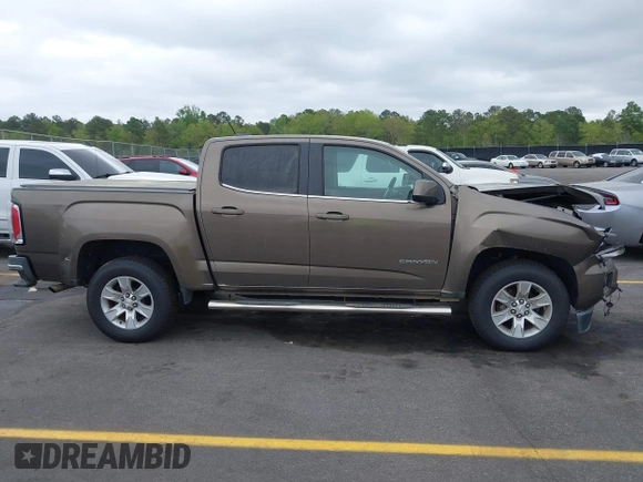 2015 GMC Canyon 2WD SLE with VIN 1GTG5BE38F1229799, listed as a IAAI auction lot 41944801 with 71,165 mi miles. Bid and sale history available at carsss.com. Image 13.