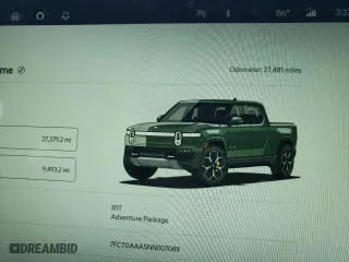 2022 Rivian R1T Adventure Package with VIN 7FCTGAAA5NN007049, listed as a Copart auction lot 74857974 with 27,481 mi miles and Salvage Title. Bid and sale history available at carsss.com. Image 9.