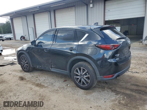 2017 Mazda CX-5 Grand Touring with VIN JM3KFBDL2H0197831, listed as a Copart auction lot 43150335 with 126,847 mi miles and Salvage Title. Bid and sale history available at carsss.com. Image 2.