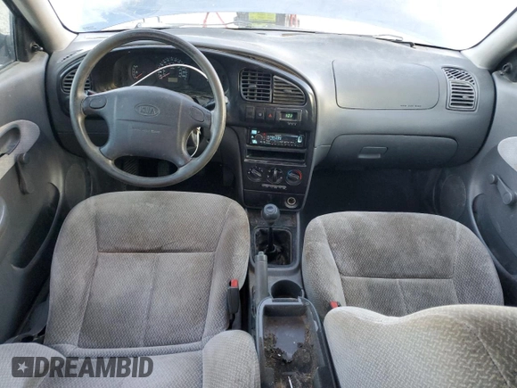 2003 Kia Spectra z VIN KNAFB121435232105, wystawiony jako Copart lot #88780695 z przebiegiem 161 466 mil mil oraz Szkoda całkowita • Salvage title. Historia ofert i sprzedaży dostępna na DreamBid. Obrazek 8.