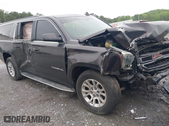 2015 GMC Yukon XL SLE z VIN 1GKS1GKC8FR507436, wystawiony jako IAAI lot #42113696 z przebiegiem Nie podano mil oraz . Historia ofert i sprzedaży dostępna na DreamBid. Obrazek 1.