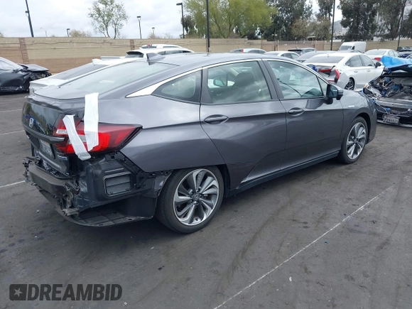 2018 Honda Clarity Plug-In Hybrid with VIN JHMZC5F14JC017006, listed as a IAAI auction lot 42064754 with 36,976 mi miles. Bid and sale history available at carsss.com. Image 4.
