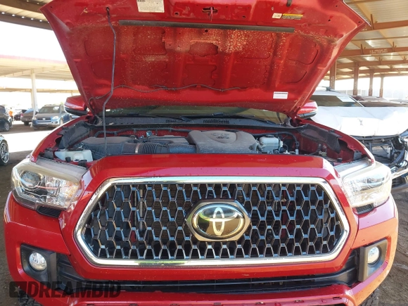 2018 Toyota Tacoma SR with VIN 3TMCZ5AN8JM141486, listed as a IAAI auction lot 42142145 with 54,851 mi miles and . Bid and sale history available at DreamBid. Image 10.