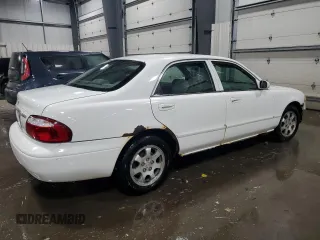 2001 Mazda 626 LX with VIN 1YVGF22C515228204, listed as a Copart auction lot 44416185 with 127,230 mi miles and Salvage Title. Bid and sale history available at carsss.com. Image 3.