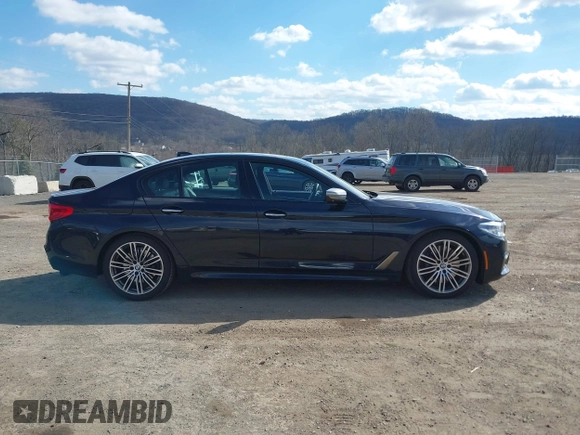 2018 BMW 5 Series M550i xDrive with VIN WBAJB9C52JB035930, listed as a IAAI auction lot 41674415 with 56,294 mi miles and . Bid and sale history available at DreamBid. Image 13.