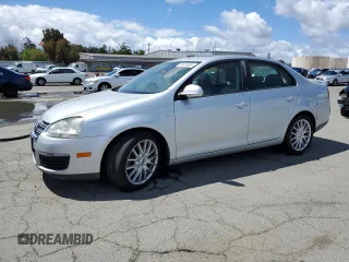 2009 Volkswagen Jetta z VIN 3VWRA71K99M043014, wystawiony jako Copart lot #56424885 z przebiegiem 140 241 mil mil oraz Czysty tytuł • Clean title. Historia ofert i sprzedaży dostępna na DreamBid. Obrazek 1.