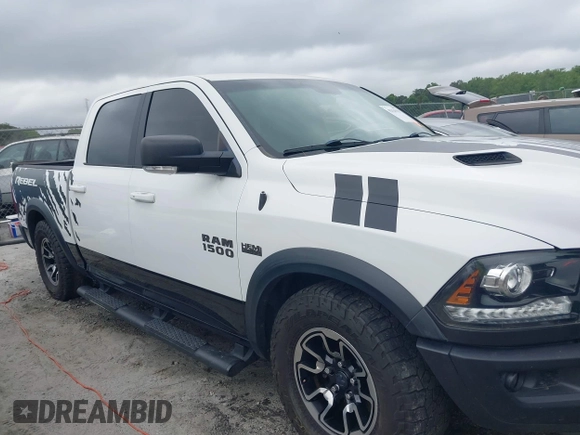 2017 Ram 1500 Rebel with VIN 1C6RR7YT7HS575529, listed as a IAAI auction lot 42125529 with 110,722 mi miles and . Bid and sale history available at DreamBid. Image 13.