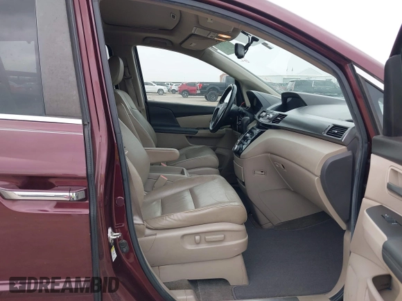 2012 Honda Odyssey EX-L with VIN 5FNRL5H61CB108301, listed as a IAAI auction lot 41939536 with 225,476 mi miles and . Bid and sale history available at DreamBid. Image 5.