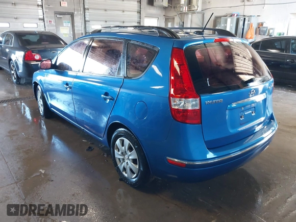 2010 Hyundai Elantra Touring SE with VIN KMHDC8AE8AU077884, listed as a IAAI auction lot 41833566 with 192,421 mi miles. Bid and sale history available at carsss.com. Image 3.