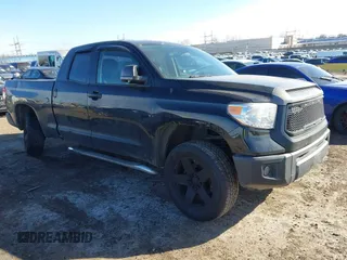 2016 Toyota Tundra 4WD Truck SR with VIN 5TFUM5F16GX064418, listed as a IAAI auction lot 41504912 with 215,241 mi miles. Bid and sale history available at carsss.com. Image 1.