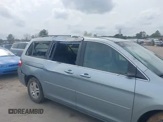 2007 Honda Odyssey EX-L z VIN 5FNRL38757B046761, wystawiony jako IAAI lot #41943033 z przebiegiem 309 270 mil mil oraz . Historia ofert i sprzedaży dostępna na DreamBid. Obrazek 6.