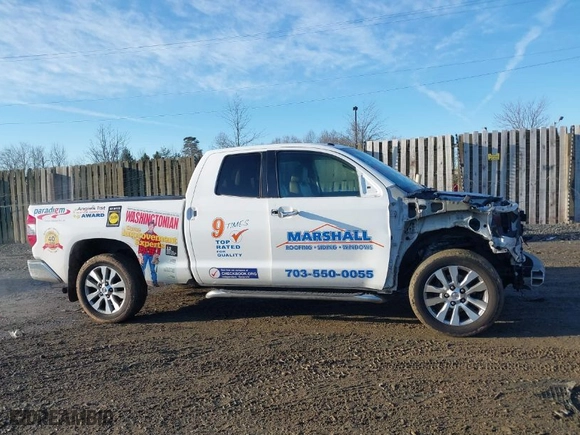 2014 Toyota Tundra 4WD Truck LTD with VIN 5TFBY5F14EX355878, listed as a IAAI auction lot 41500114 with 256,096 mi miles. Bid and sale history available at carsss.com. Image 13.
