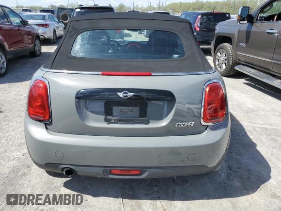 2016 MINI Convertible with VIN WMWWG5C57G3C19380, listed as a Copart auction lot 50645324 with 76,396 mi miles and Salvage title. Bid and sale history available at DreamBid. Image 6.