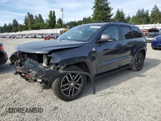 2017 Jeep Grand Cherokee Trailhawk with VIN 1C4RJFLTXHC694641, listed as a Copart auction lot 59981485 with 109,491 mi miles and Salvage title. Bid and sale history available at DreamBid. Image 1.
