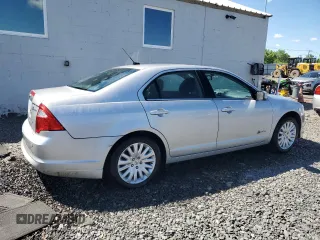 2010 Ford Fusion Hybrid z VIN 3FADP0L36AR211312, wystawiony jako Copart lot #55749425 z przebiegiem 39 223 mil mil oraz Szkoda całkowita • Salvage title. Historia ofert i sprzedaży dostępna na DreamBid. Obrazek 3.