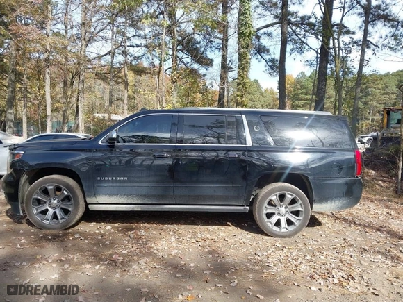 2015 Chevrolet Suburban LTZ with VIN 1GNSKKKC4FR304109, listed as a IAAI auction lot 40757721 with 192,652 mi miles. Bid and sale history available at carsss.com. Image 14.