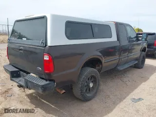 2000 Ford Super Duty F-350 SRW XL with VIN 1FTSX31FXYEB52620, listed as a IAAI auction lot 41944992 with 213,712 mi miles. Bid and sale history available at carsss.com. Image 4.