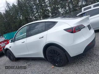 2023 Tesla Model Y Long Range z VIN 7SAYGAEEXPF647352, wystawiony jako IAAI lot #41955933 z przebiegiem Nie podano mil oraz . Historia ofert i sprzedaży dostępna na DreamBid. Obrazek 15.