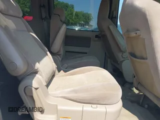 2006 Ford Freestar SE z VIN 2FMDA51666BA57711, wystawiony jako IAAI lot #39989040 z przebiegiem Nie podano mil oraz . Historia ofert i sprzedaży dostępna na DreamBid. Obrazek 8.