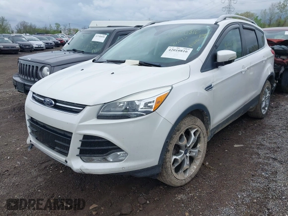 2016 Ford Escape Titanium with VIN 1FMCU9J94GUC22994, listed as a IAAI auction lot 42010816 with 80,293 mi miles. Bid and sale history available at carsss.com. Image 2.