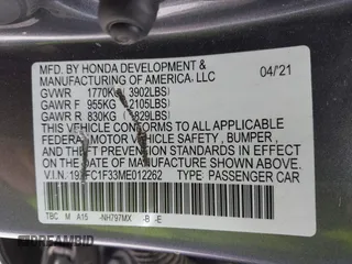 2021 Honda Civic Sedan EX with VIN 19XFC1F33ME012262, listed as a IAAI auction lot 41880047 with 67,861 mi miles. Bid and sale history available at carsss.com. Image 9.