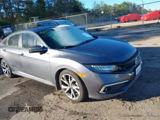 2020 Honda Civic Sedan Touring with VIN 19XFC1F97LE001901, listed as a IAAI auction lot 41048129 with 67,027 mi miles. Bid and sale history available at carsss.com. Image 1.