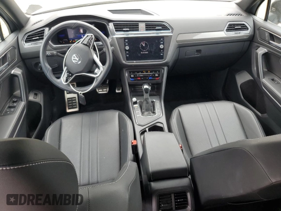 2023 Volkswagen Tiguan SE R-Line Black с VIN 3VVCB7AX4PM038156, выставлен на аукционе Copart как лот 58963155 с пробегом 24 871 миль миль и Списание • Salvage title. История ставок и продаж доступна на DreamBid. Изображение 8.