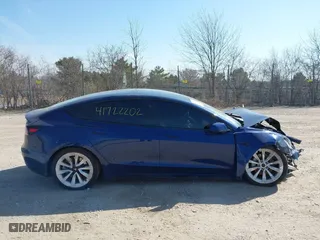 2022 Tesla Model 3 Long Range with VIN 5YJ3E1EB0NF191717, listed as a IAAI auction lot 41722202 with 67,811 mi miles. Bid and sale history available at carsss.com. Image 12.