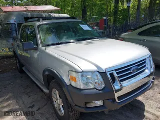 2007 Ford Explorer Sport Trac XLT with VIN 1FMEU51K47UA09905, listed as a IAAI auction lot 42063335 with 156,987 mi miles. Bid and sale history available at carsss.com. Image 1.