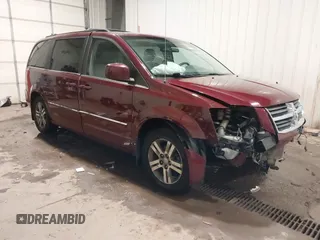 2009 Dodge Grand Caravan SXT z VIN 2D8HN54X39R551424, wystawiony jako IAAI lot #41370081 z przebiegiem 176 614 mil mil oraz . Historia ofert i sprzedaży dostępna na DreamBid. Obrazek 1.
