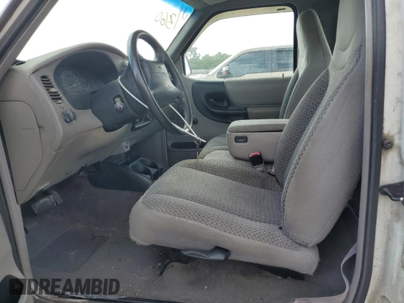 1999 Ford Ranger XL with VIN 1FTYR10C6XPA43770, listed as a Copart auction lot 63831315 with 18,858 mi miles and Salvage title. Bid and sale history available at DreamBid. Image 7.