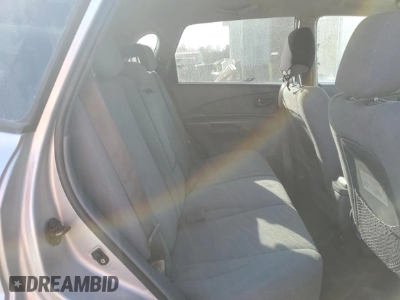 2005 Hyundai Tucson GL with VIN KM8JM12B95U067091, listed as a Copart auction lot 79297524 with Not Provided miles and Salvage Title. Bid and sale history available at carsss.com. Image 11.